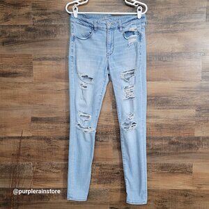 American Eagle Jeans 12 L Jegging Mid Rise Next Level Stretch Medium Light Wash